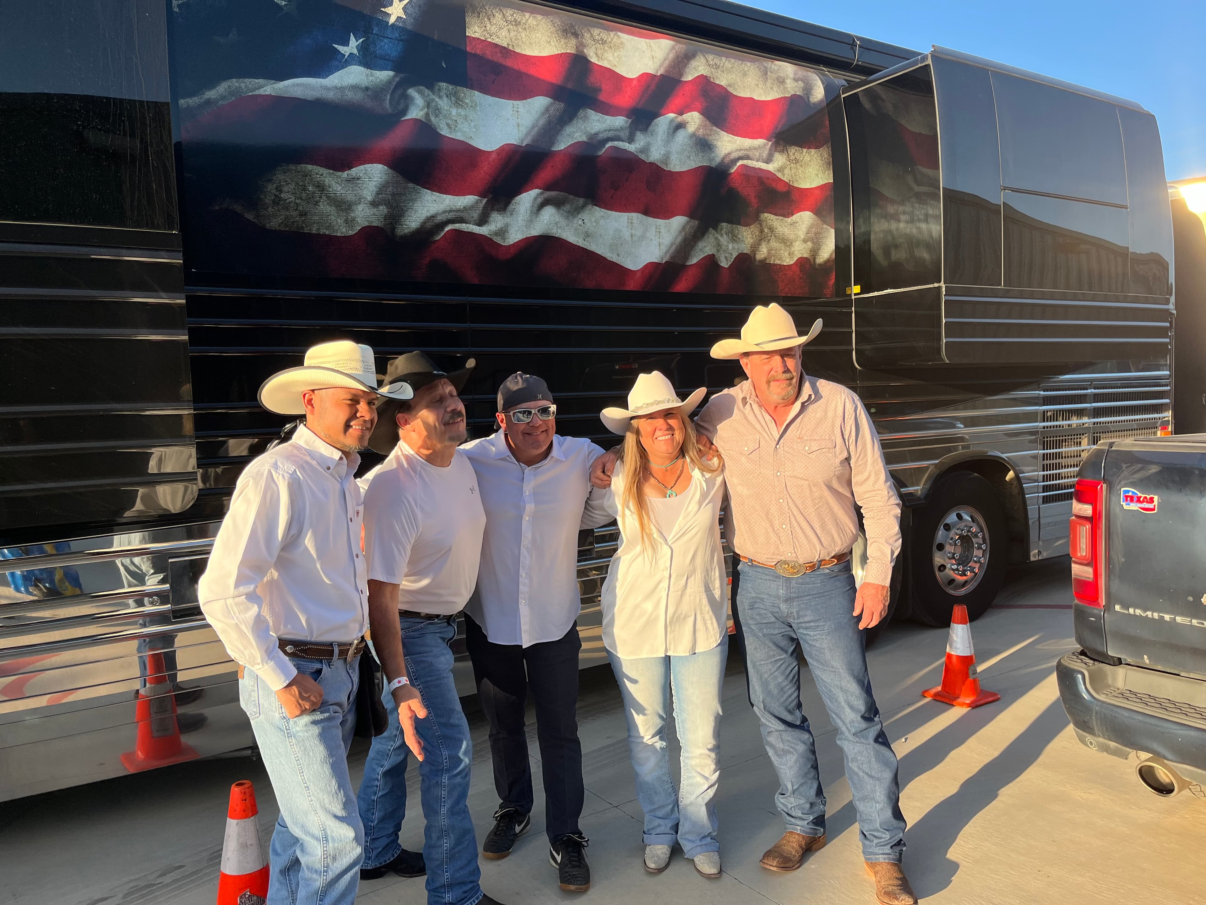 Wesley Coats performing with band members at a Texas country music venue